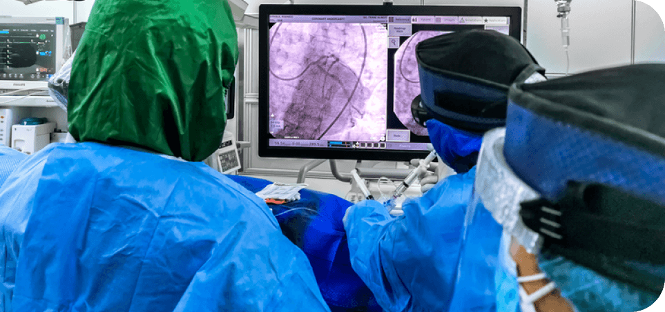 doctors performing angiography