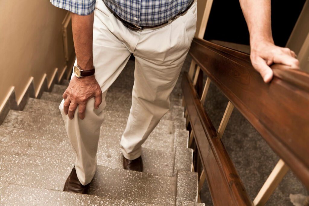 man walking up stairs