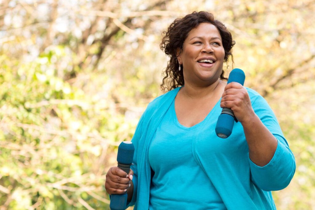 woman walking with weights